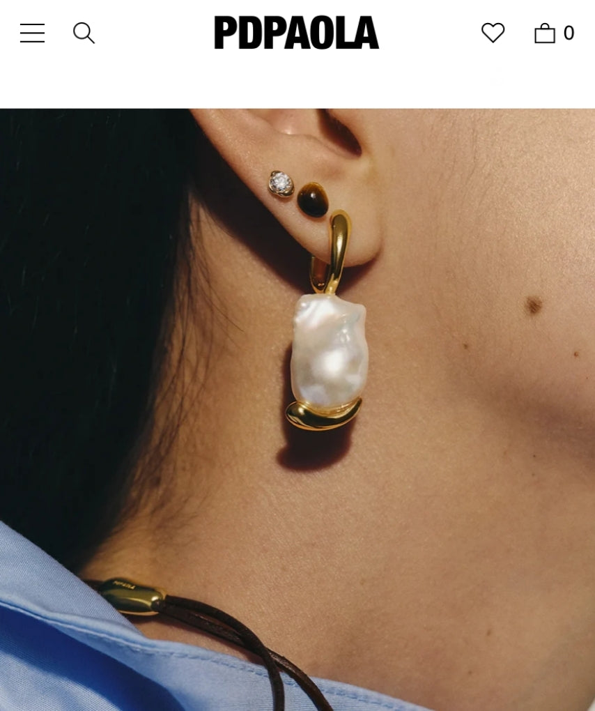 Shopify jewelry sites showcasing minimalist branding and luxury ecommerce design